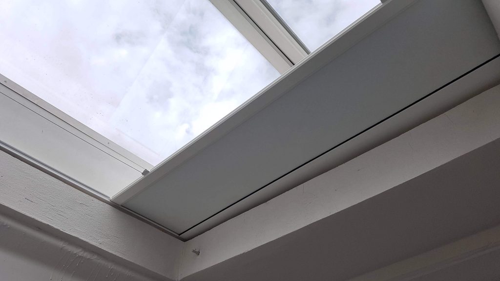 KuroLok RL motorised Rooflight blind, Spectrum 1010 blackout fabric, Special RAL painted hardware