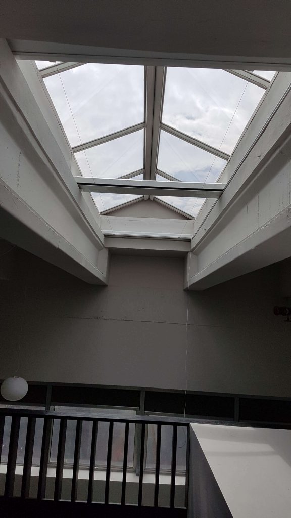 KuroLok RL motorised Rooflight blind, Spectrum 1010 blackout fabric, Special RAL painted hardware