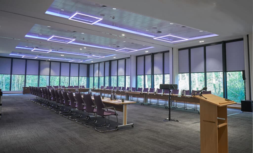 a conference room with umbra blinds installed